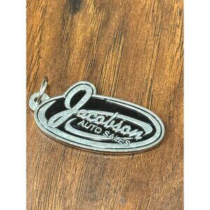 Jacobson Auto Sales Dealership Metal Keychain With Black Enamel Oval Design